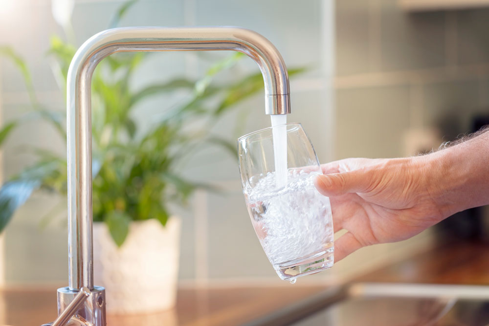 filling a glass with water
